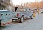 Mushers take their dogs to be checked at Iditarod headquarters. Mushers take their dogs to be checked at Iditarod headquarters.